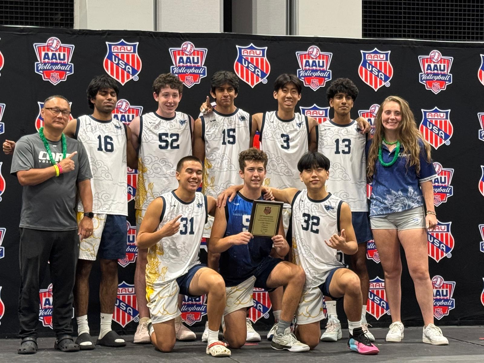 The team and coaches on a podium in front of an AAU Volleyball backdrop, holding a championship plaque